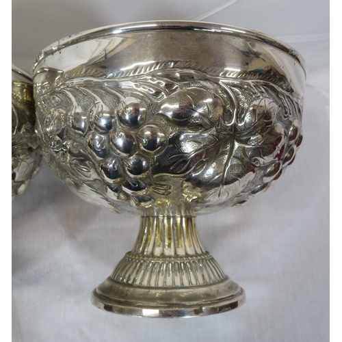 323 - Pair of round silverplated flower bowls with ornate grapevine embossing on spreading round bases