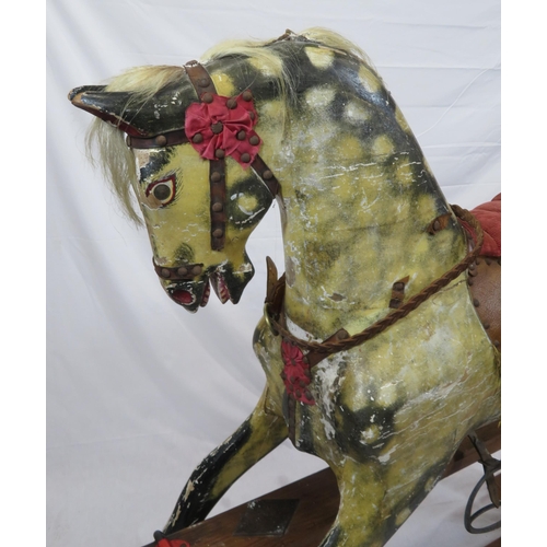 325 - Edwardian painted rocking horse with upholstered saddle & bridle, on timber base, by J Collinson & S... 