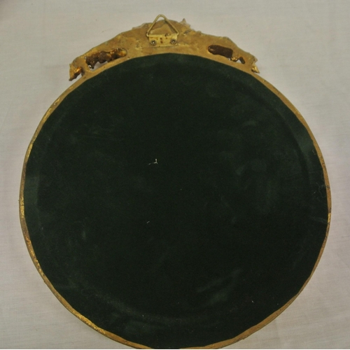 327 - Regency design round bevelled glass wall mirror with foliate decorated frame & pediment