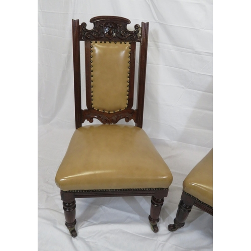 346 - Pair of Victorian bath side chairs with leatherette upholstery, foliate carving, on turned legs