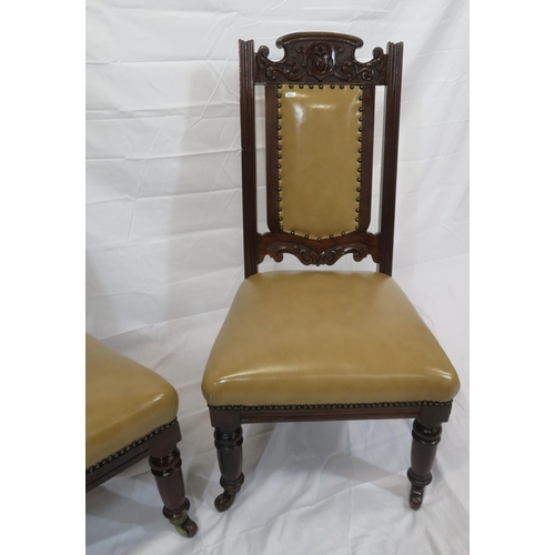 346 - Pair of Victorian bath side chairs with leatherette upholstery, foliate carving, on turned legs