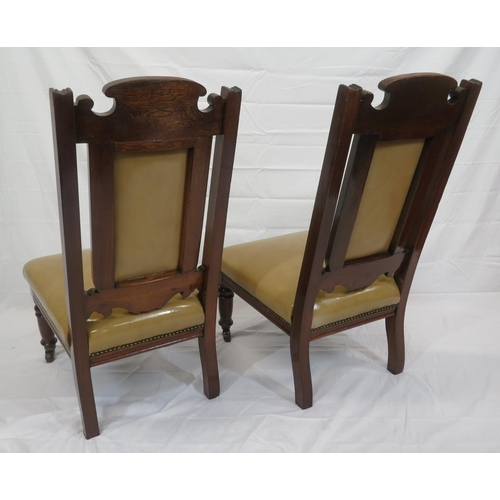 346 - Pair of Victorian bath side chairs with leatherette upholstery, foliate carving, on turned legs