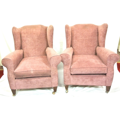 361 - Pair of Georgian upholstered wingback armchairs with shaped arms, cushions, on square tapering legs ... 