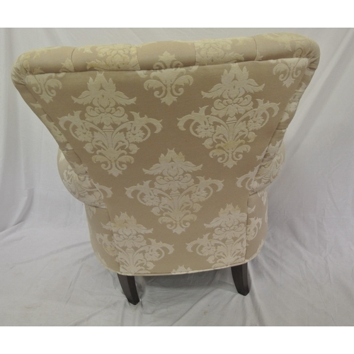 365 - Victorian style large upholstered armchair with buttoned back, on turned tapering legs