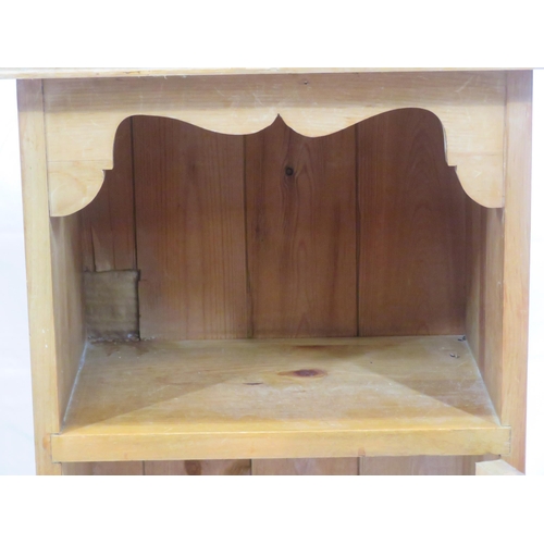 84 - Pair of pine bedside lockers with shaped backs, panelled doors, on bracket feet