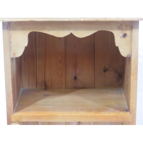 84 - Pair of pine bedside lockers with shaped backs, panelled doors, on bracket feet