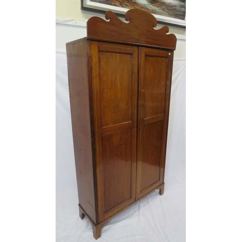 85 - Edwardian inlaid small wardrobe with shaped pediment, panelled doors, fitted with hanging, on bracke... 