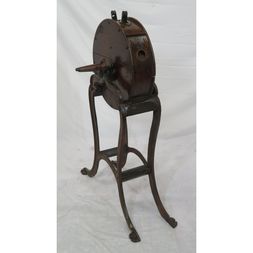 98 - Edwardian timber & cast iron knife sharpener with round top, shaped handles, on cast iron base