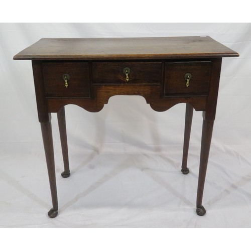 321 - Victorian oak lowboy with three drawers, brass teardrop handles, on cabriole legs with pad feet