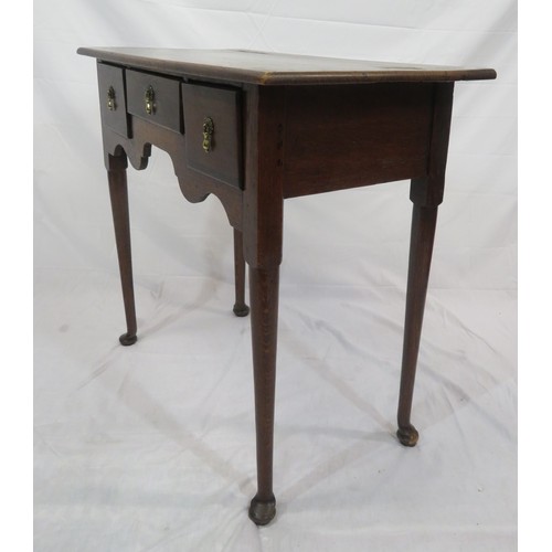 321 - Victorian oak lowboy with three drawers, brass teardrop handles, on cabriole legs with pad feet