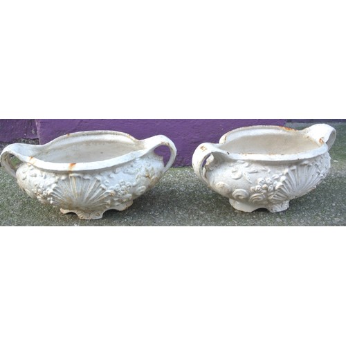 227 - Pair of oval cast iron planters with foliate decoration and shaped handles