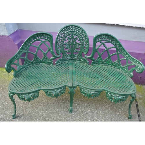 356 - Cast iron garden bench with triple domed back, foliate and honeycomb decoration, on shaped legs