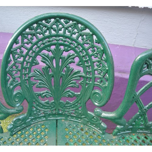 356 - Cast iron garden bench with triple domed back, foliate and honeycomb decoration, on shaped legs