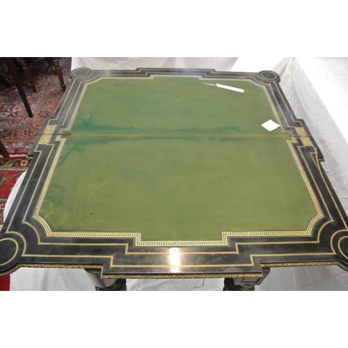 160 - French Empire style ebonised card table with fold-over top, brass inlay, 'dog-ear' candle corners, r... 