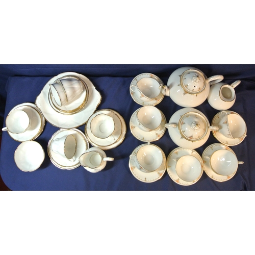 104 - Lot of Royal Albert and other tea ware in box