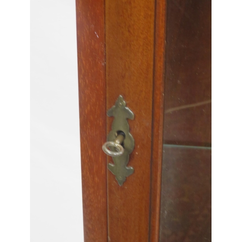 116 - Edwardian style bow fronted display cabinet with glazed door, sides and shelving, on cabriole legs