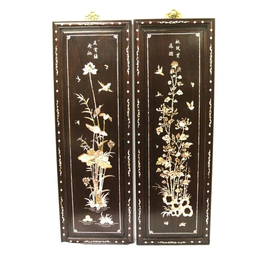 122 - Pair of Oriental oblong rosewood wall plaques with Mother of Pearl foliate decoration