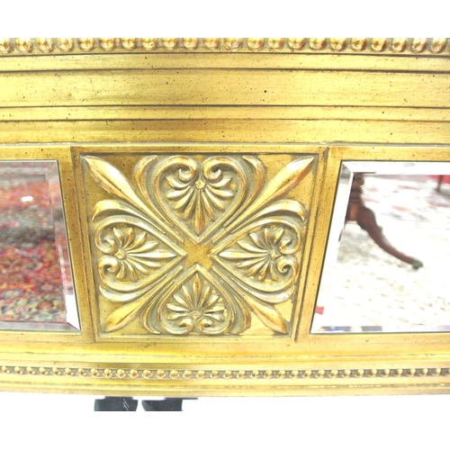 129 - Regency design gilt framed overmantle with bevelled mirror insets, foliate and beaded decoration