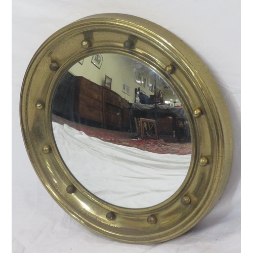 137 - Regency design gilt framed convex mirror with ball decoration