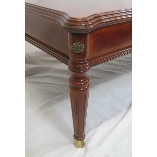 141 - Edwardian design inlaid oblong occasional table with shaped corners, on turned tapering legs