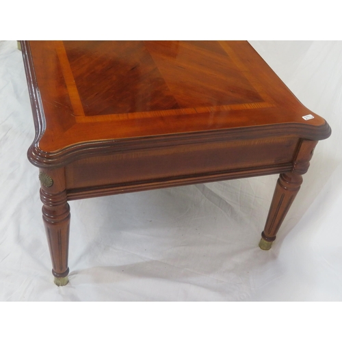 141 - Edwardian design inlaid oblong occasional table with shaped corners, on turned tapering legs