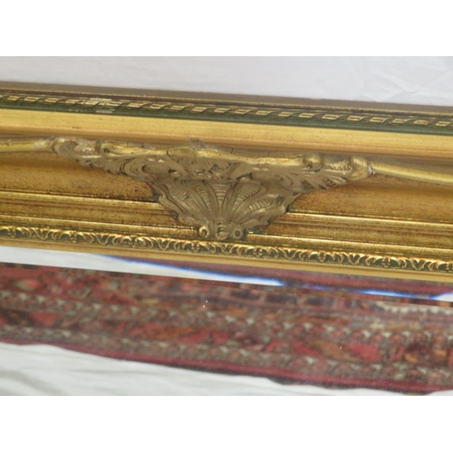 147 - Regency design gilt framed bevelled glass wall mirror with ornate foliate decoration