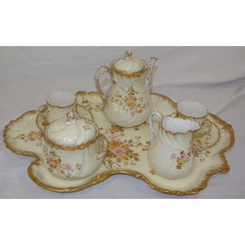 153 - Ornate Limoges 8 piece tea service with ornate gilt and foliate decoration