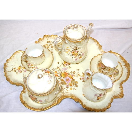 153 - Ornate Limoges 8 piece tea service with ornate gilt and foliate decoration