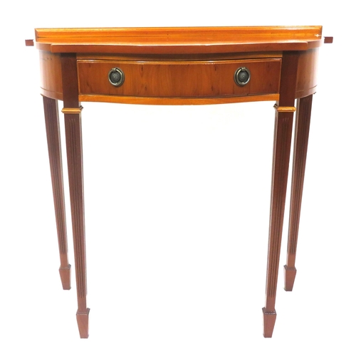 159 - Edwardian design serpentine fronted yew hall or side table with shaped drawer, reeded tapering legs ... 