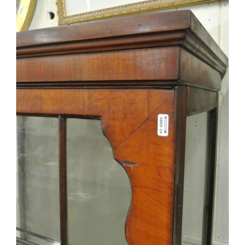 160 - Edwardian walnut and mahogany display cabinet with glazed door, sides and shelving, press under with... 