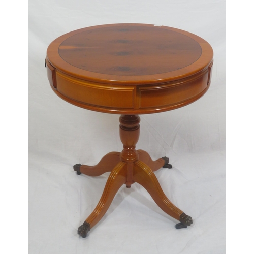 181 - Edwardian design inlaid yew round occasional table with bowed drawers, vase turned column, on reeded... 