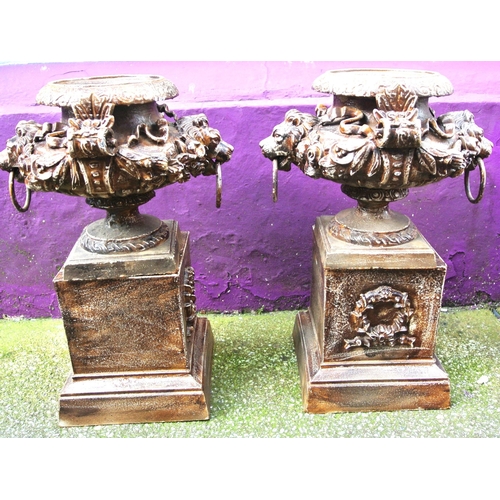 204 - Pair of Victorian style cast iron 'Lion head' garden urns with ornate foliate decoration and handles... 