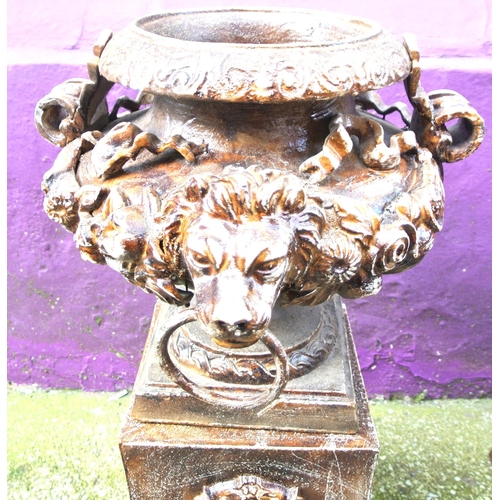 204 - Pair of Victorian style cast iron 'Lion head' garden urns with ornate foliate decoration and handles... 