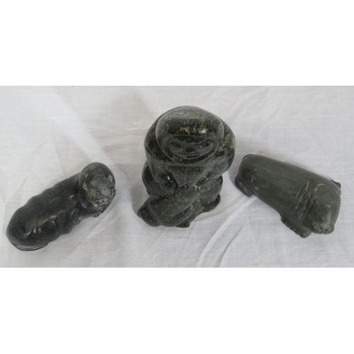 209 - Sasquatch carved marble figure of an Eskimo and 2 seals