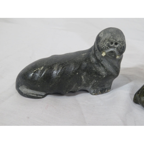 209 - Sasquatch carved marble figure of an Eskimo and 2 seals