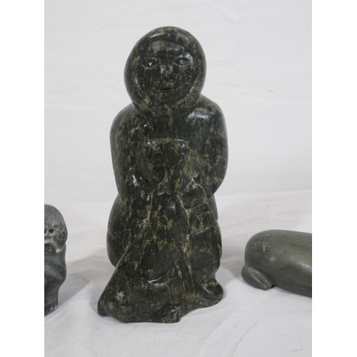 209 - Sasquatch carved marble figure of an Eskimo and 2 seals