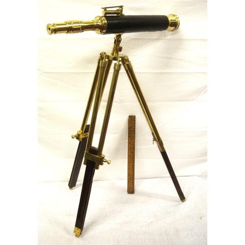 237 - Mariners brass telescope with lens cover and spirit level, on adjustable tripod stand