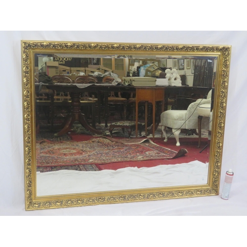 244 - Large Regency design gilt framed bevelled glass mirror with scroll and foliate decoration