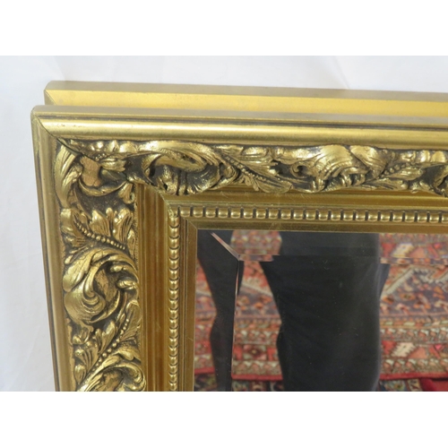 244 - Large Regency design gilt framed bevelled glass mirror with scroll and foliate decoration