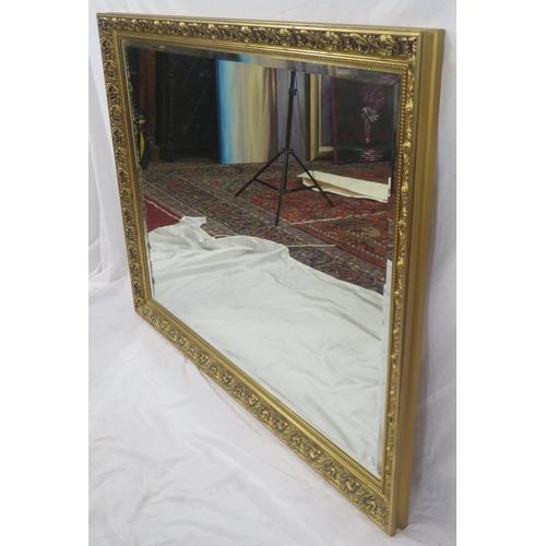 244 - Large Regency design gilt framed bevelled glass mirror with scroll and foliate decoration