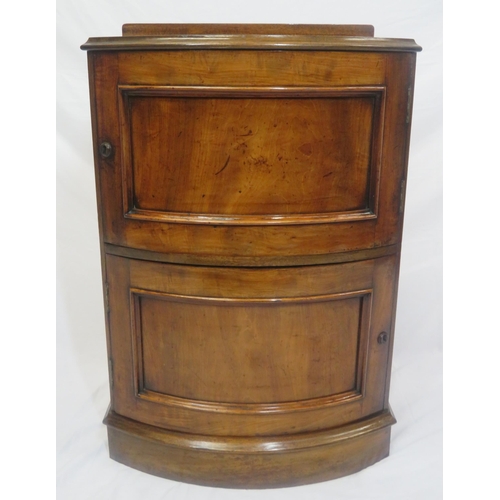 246 - Edwardian style bowfront cabinet with double panelled doors, on shaped plinth