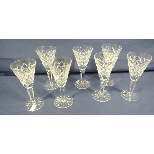 249 - Set of 7 Waterford Crystal cut glass trumpet shaped wine glasses with hexagonal stems and round base... 