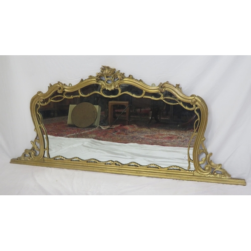 254 - Regency style gilt overmantle with scroll shaped frame an foliate decoration