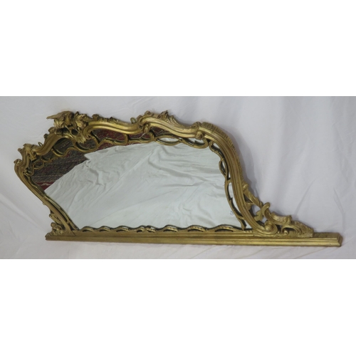 254 - Regency style gilt overmantle with scroll shaped frame an foliate decoration