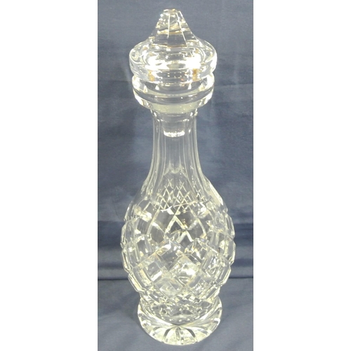 258 - Waterford Crystal cut glass baluster shaped decanter with stopper, diamond decoration and round base