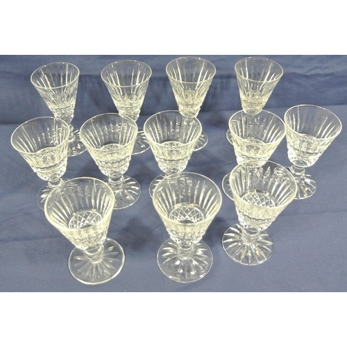 259 - 12 assorted Waterford Crystal cut glass sherry glasses with knop stems