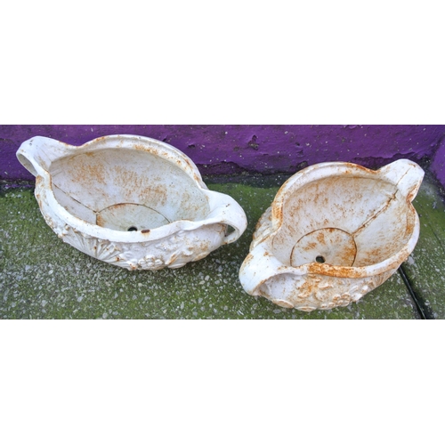 264 - Pair of oval cast iron garden planters with foliate decoration and shaped handles