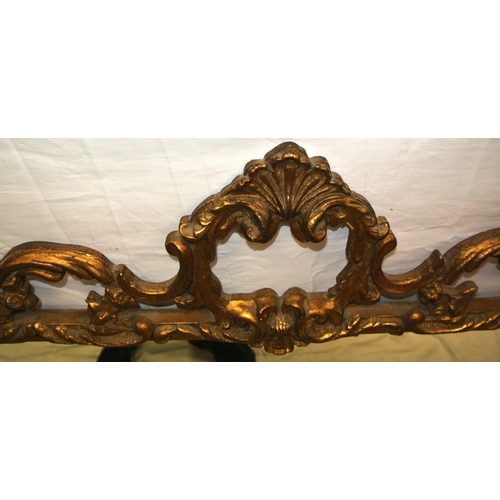 273 - Regency design gilt framed wall mirror with ornate foliate, shell and scroll decoration