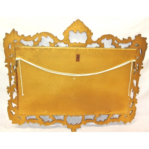 273 - Regency design gilt framed wall mirror with ornate foliate, shell and scroll decoration