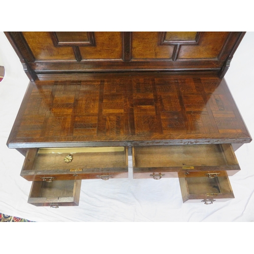 275 - Dutch style mahogany and walnut bureau with railed top, panelled drop-down front with leatherette in... 